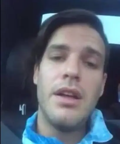 A man sitting in a car